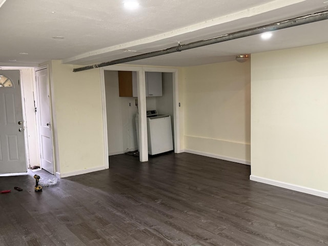 1246 Troy Ave, Brooklyn, NY 11203 - finished below grade area with washer / clothes dryer, dark wood-style flooring, and baseboards