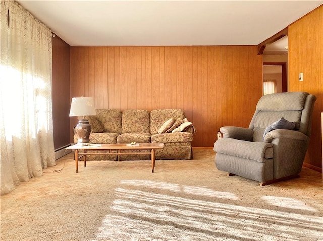 carpeted living room with wood walls