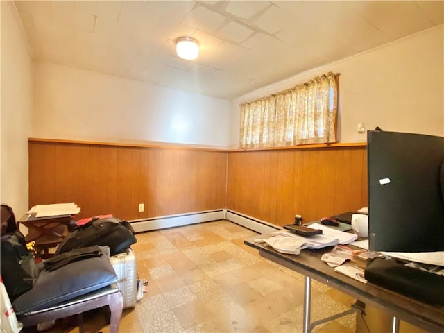 interior space featuring wooden walls and a baseboard radiator