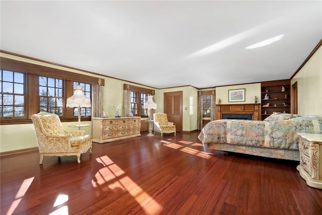 bedroom featuring dark hardwood / wood-style floors and ornamental molding