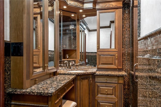 bathroom featuring vanity and crown molding