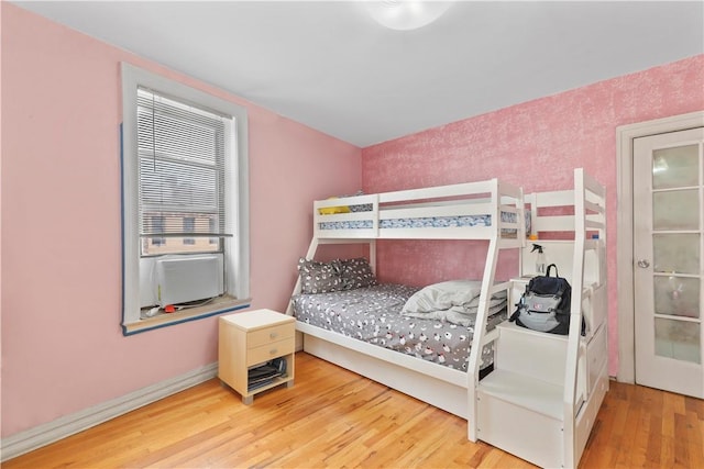 bedroom featuring hardwood / wood-style flooring