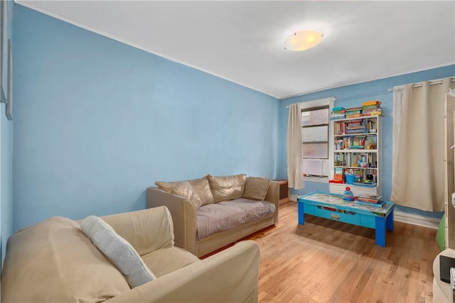 sitting room with light hardwood / wood-style flooring