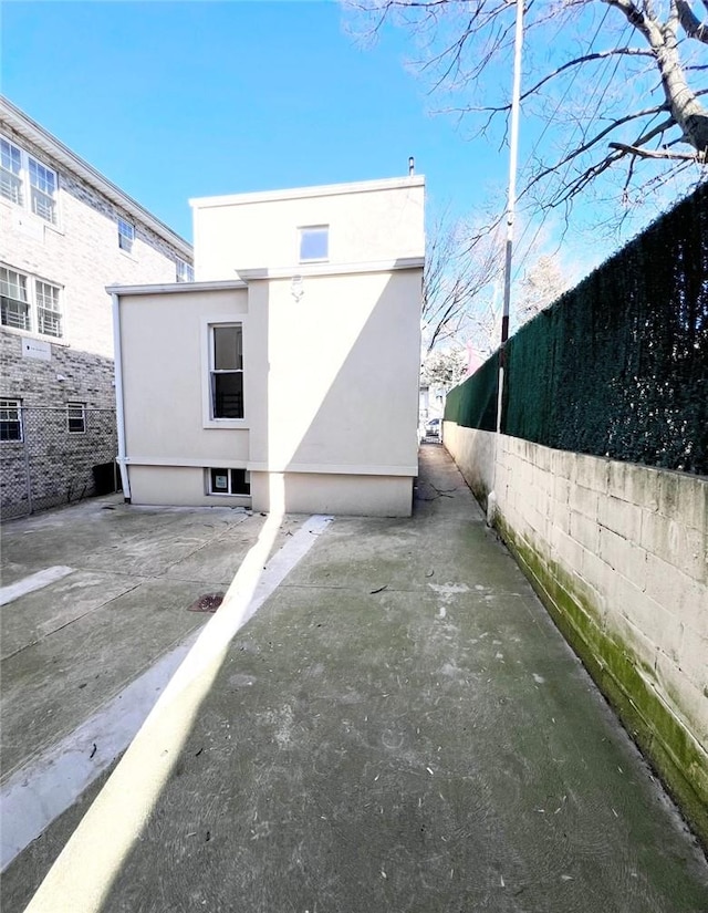 back of house featuring a patio