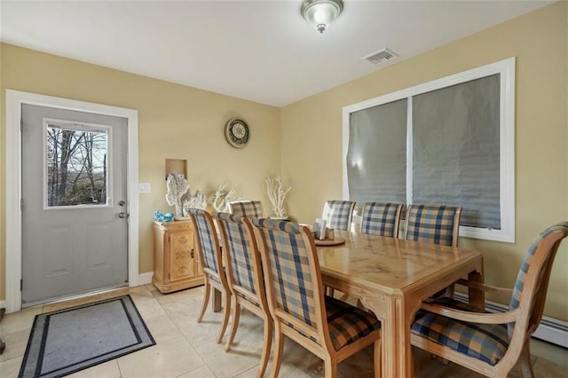 view of tiled dining room