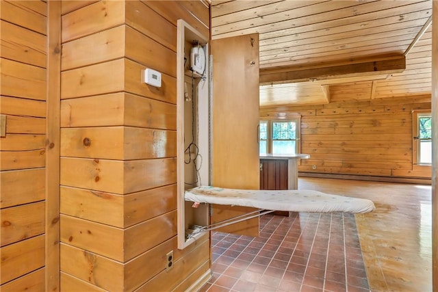 view of sauna / steam room featuring tile patterned floors and a healthy amount of sunlight