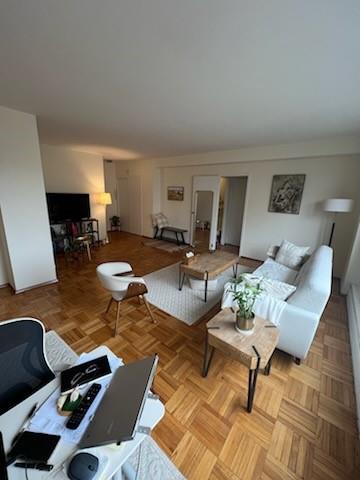 living room featuring light parquet floors