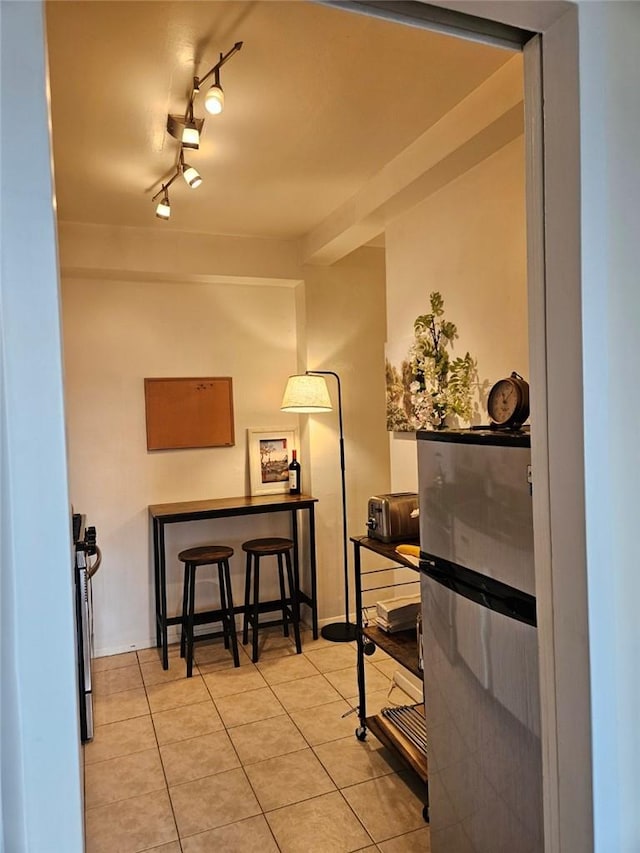 miscellaneous room featuring light tile patterned floors