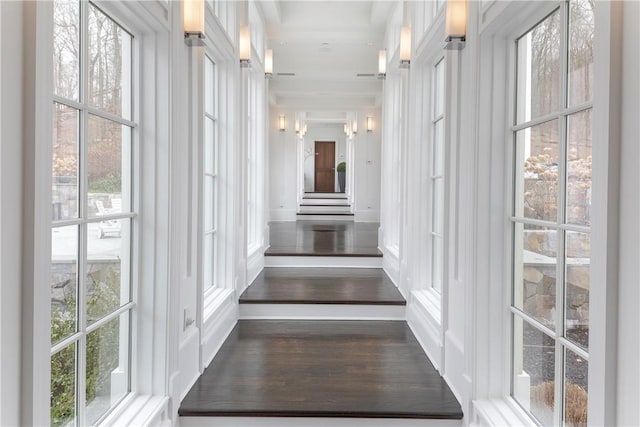 hallway with wood-type flooring