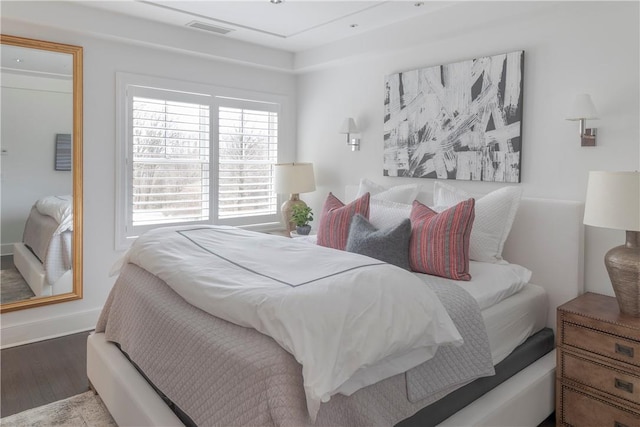 bedroom with wood-type flooring