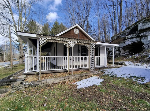 view of front facade featuring covered porch