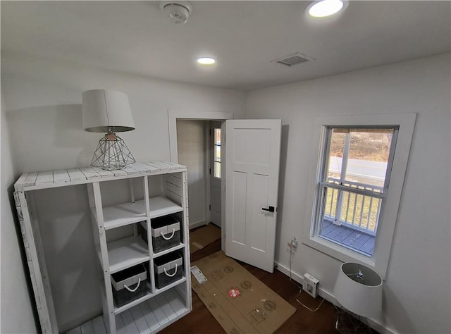 doorway featuring dark hardwood / wood-style floors