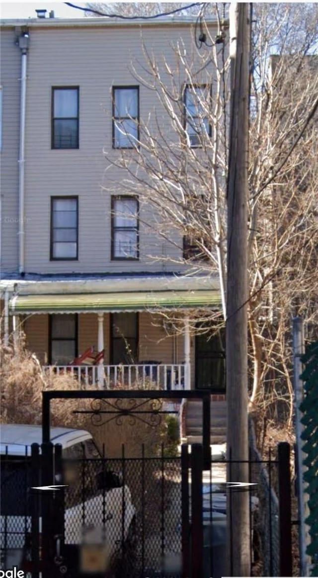 view of front of home with a balcony