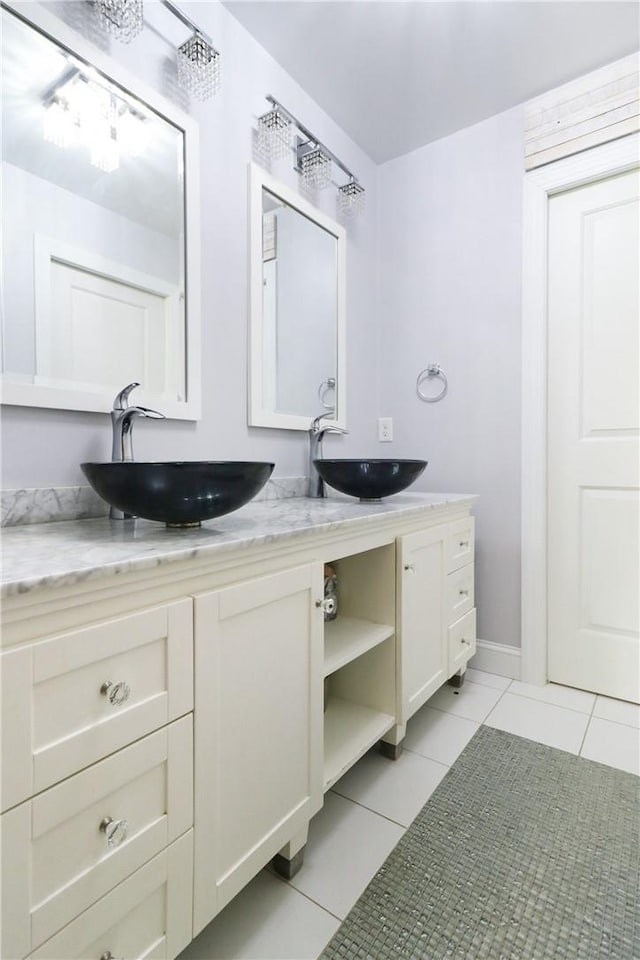 bathroom featuring tile patterned floors and vanity