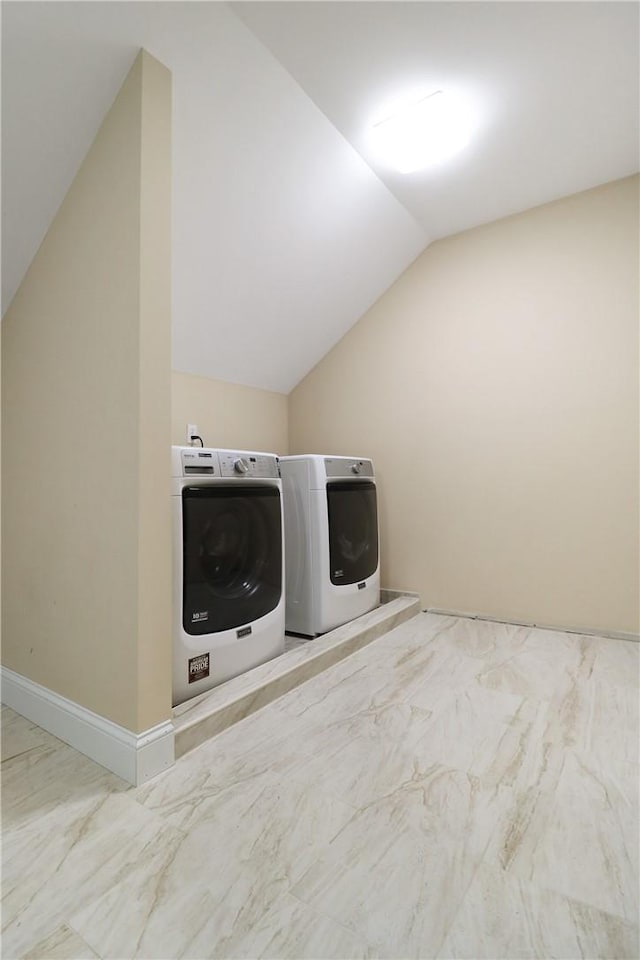 clothes washing area featuring independent washer and dryer