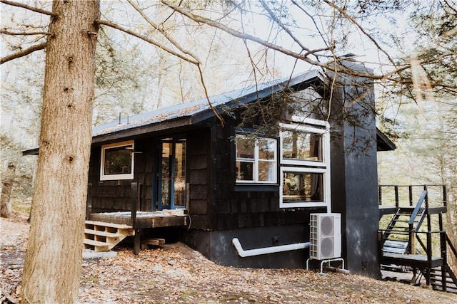 view of home's exterior featuring ac unit