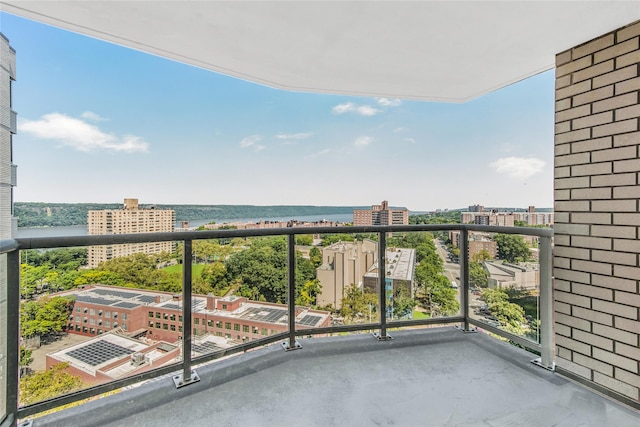 balcony featuring a water view