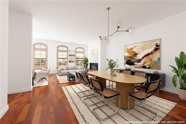 dining room with hardwood / wood-style flooring and an inviting chandelier