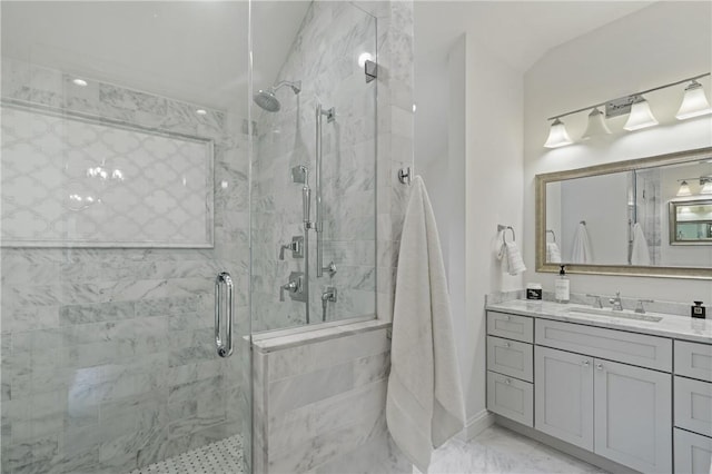 bathroom with vanity and walk in shower