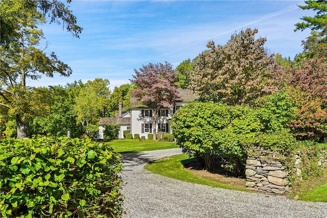 surrounding community featuring a lawn