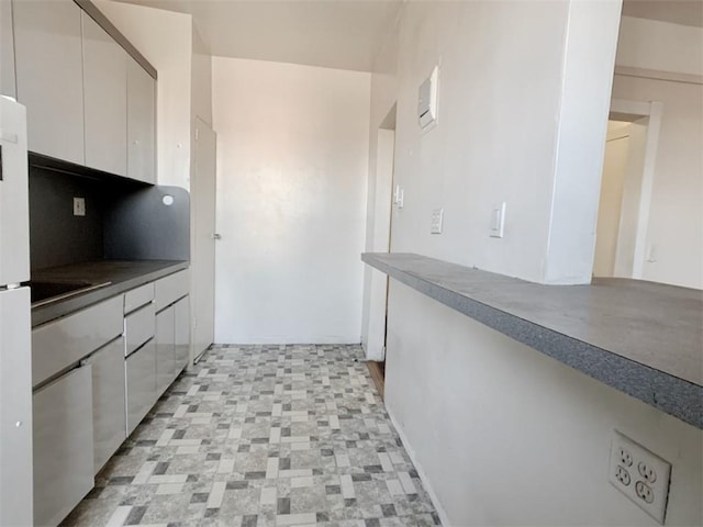 kitchen featuring white cabinets