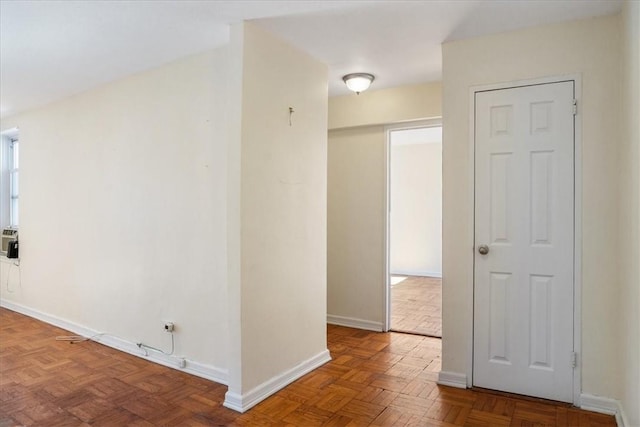 corridor featuring parquet floors