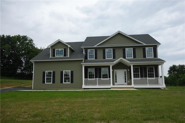 colonial-style house with covered porch and a front lawn