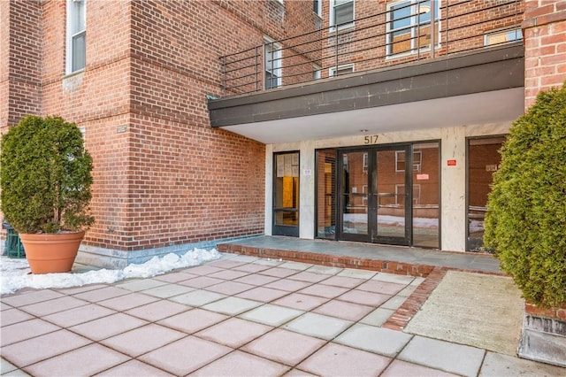 property entrance with french doors and a patio