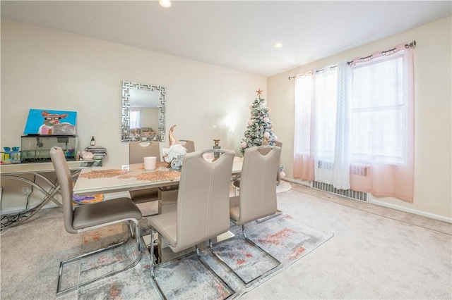 view of carpeted dining area