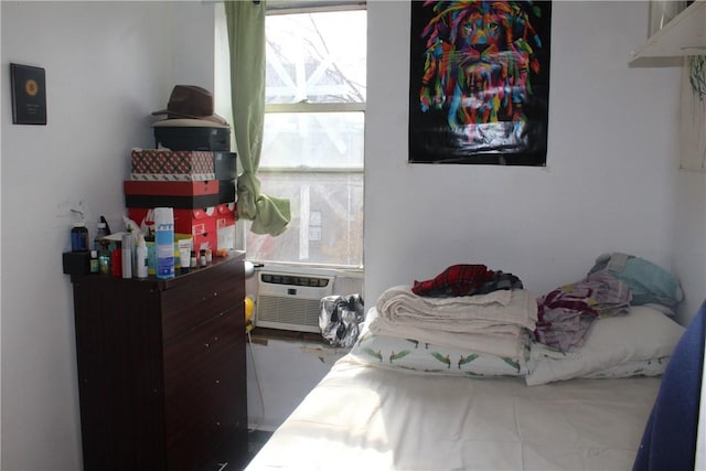 bedroom featuring multiple windows