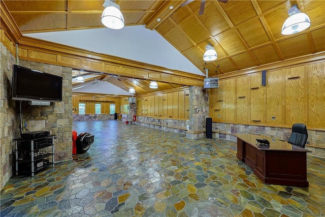 interior space with beamed ceiling, ceiling fan, wood walls, and wood ceiling