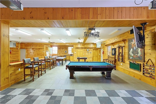 recreation room featuring wooden walls and pool table