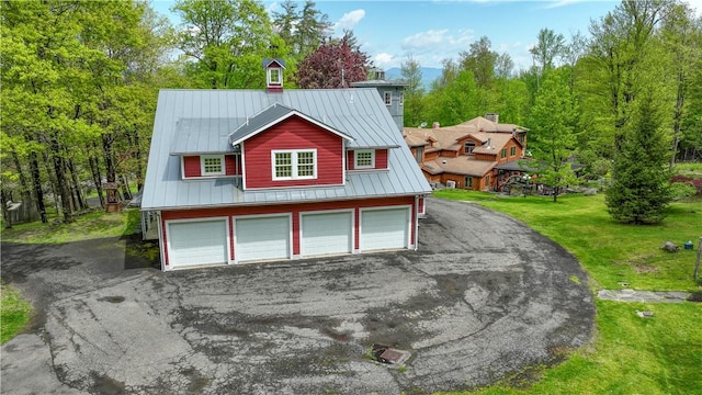 garage with a lawn