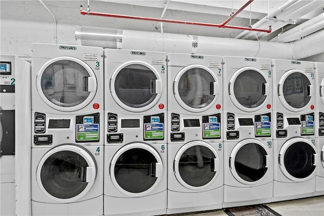 clothes washing area with independent washer and dryer and stacked washer / dryer