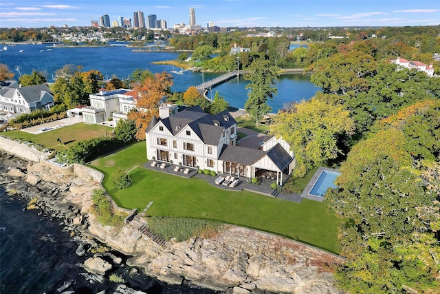 drone / aerial view with a water view