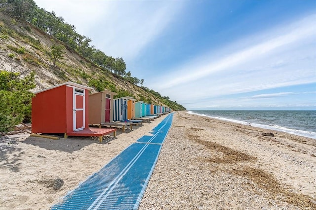 property view of water featuring a beach view