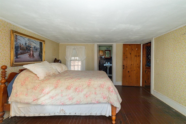 bedroom featuring crown molding and dark wood-type flooring