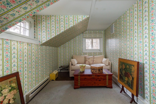 interior space with baseboard heating and vaulted ceiling