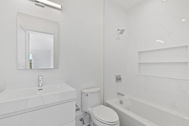 full bathroom featuring vanity, toilet, and washtub / shower combination