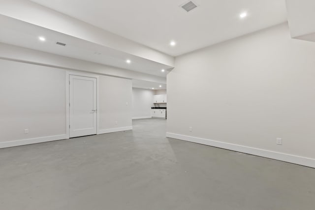 interior space with recessed lighting, visible vents, and baseboards