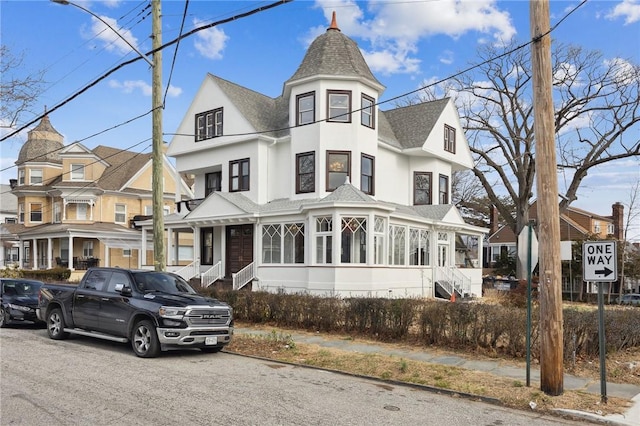 101 Summit Ave, Mount Vernon, NY 10550 - victorian home with roof with shingles and stucco siding