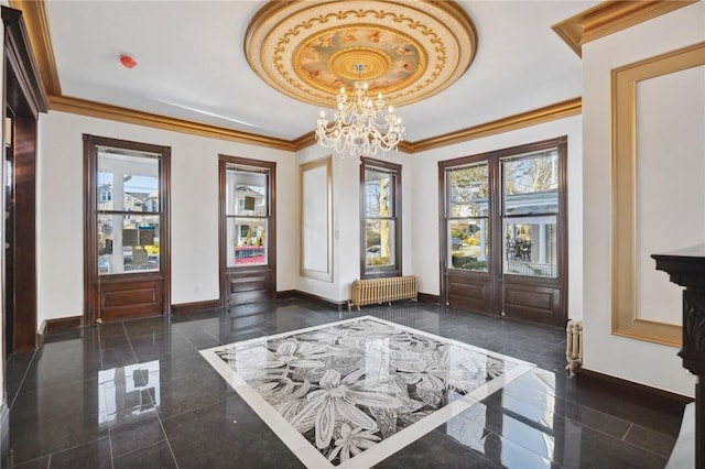 doorway featuring radiator heating unit, an inviting chandelier, french doors, and ornamental molding