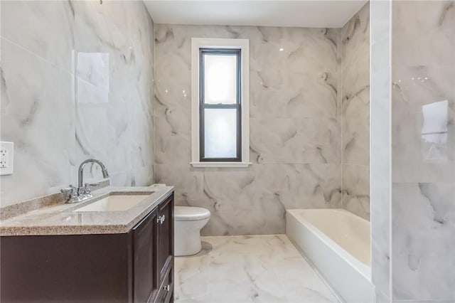 101 Summit Ave, Mount Vernon, NY 10550 - bathroom with toilet, vanity, a tub to relax in, tile walls, and marble finish flooring