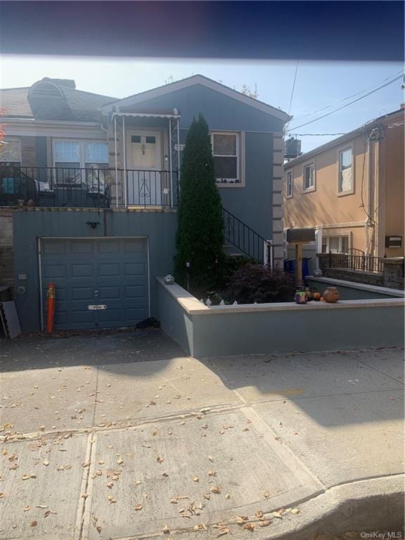 view of front of home featuring a garage