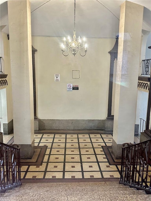 dining area with an inviting chandelier