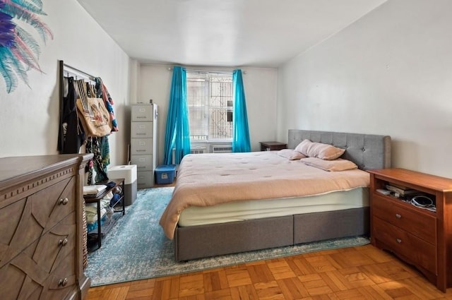 bedroom featuring light parquet flooring