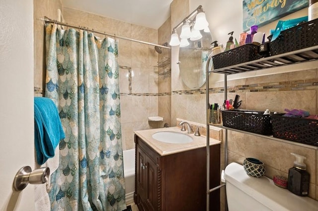 full bathroom featuring vanity, backsplash, toilet, shower / bathtub combination with curtain, and tile walls