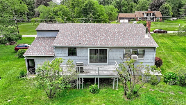138 Reinhardt Rd, Middletown, NY 10940 - back of property with roof with shingles, a wooden deck, a lawn, and a chimney