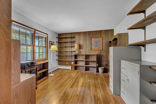 138 Reinhardt Rd, Middletown, NY 10940 - office area with wood-type flooring, wooden walls, and baseboard heating