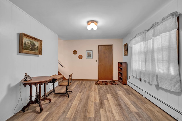 138 Reinhardt Rd, Middletown, NY 10940 - foyer entrance featuring a baseboard heating unit, wood finished floors, and stairs